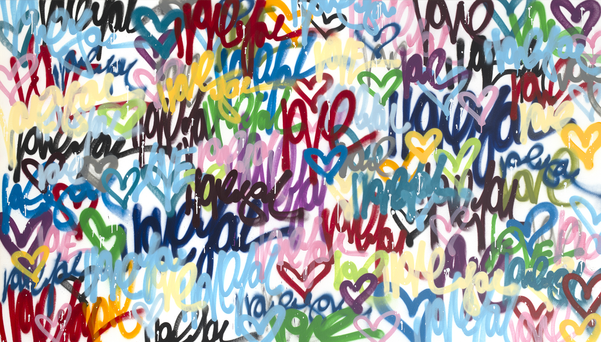 Colorful graffiti-style words and hearts on a white wall. Colorful graffiti-style words and hearts on a white wall.