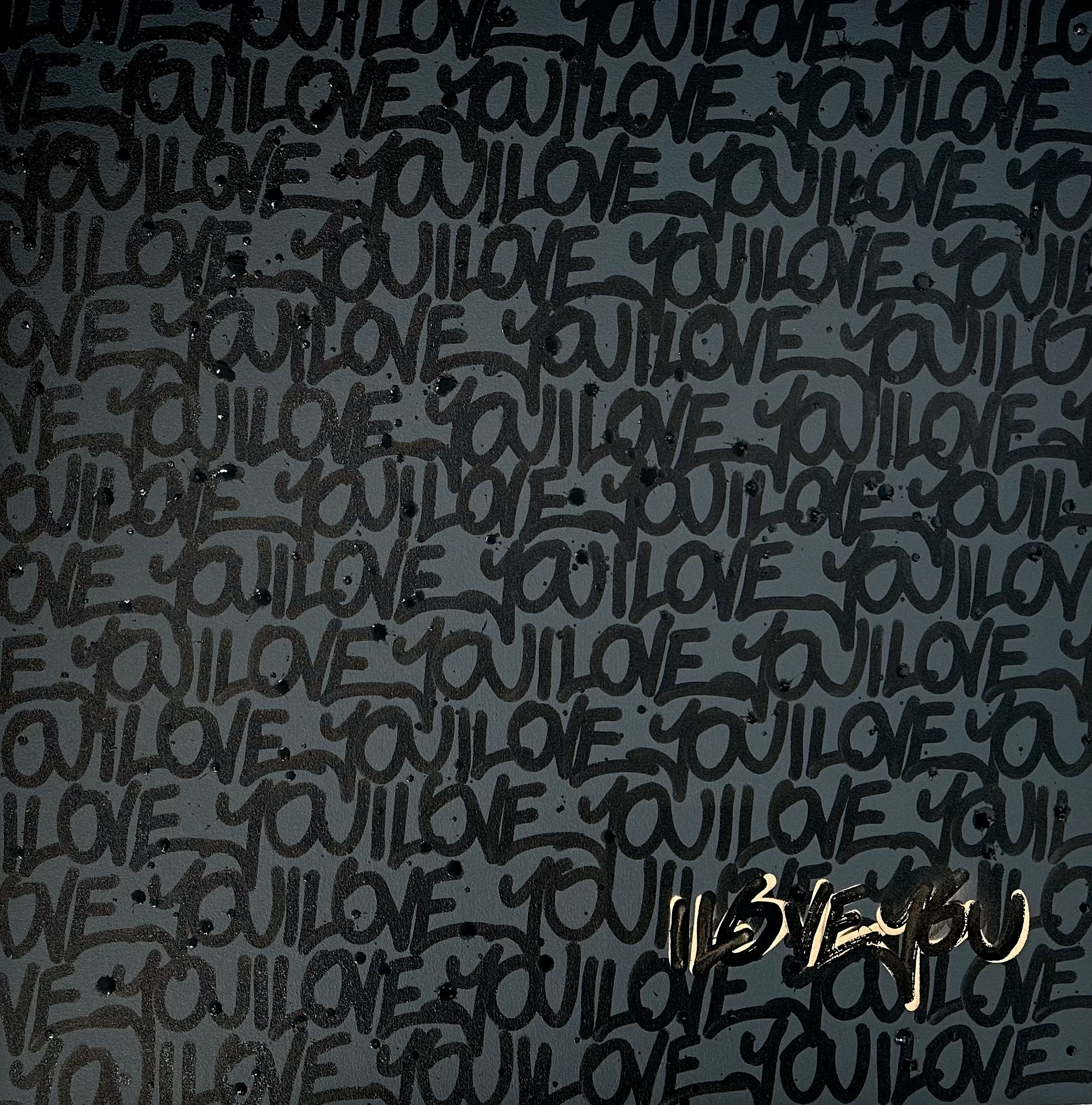 A pattern of the word ‘J’AIME’ repeated in various sizes and orientations. A pattern of the word 'J'AIME' repeated in various sizes and orientations.