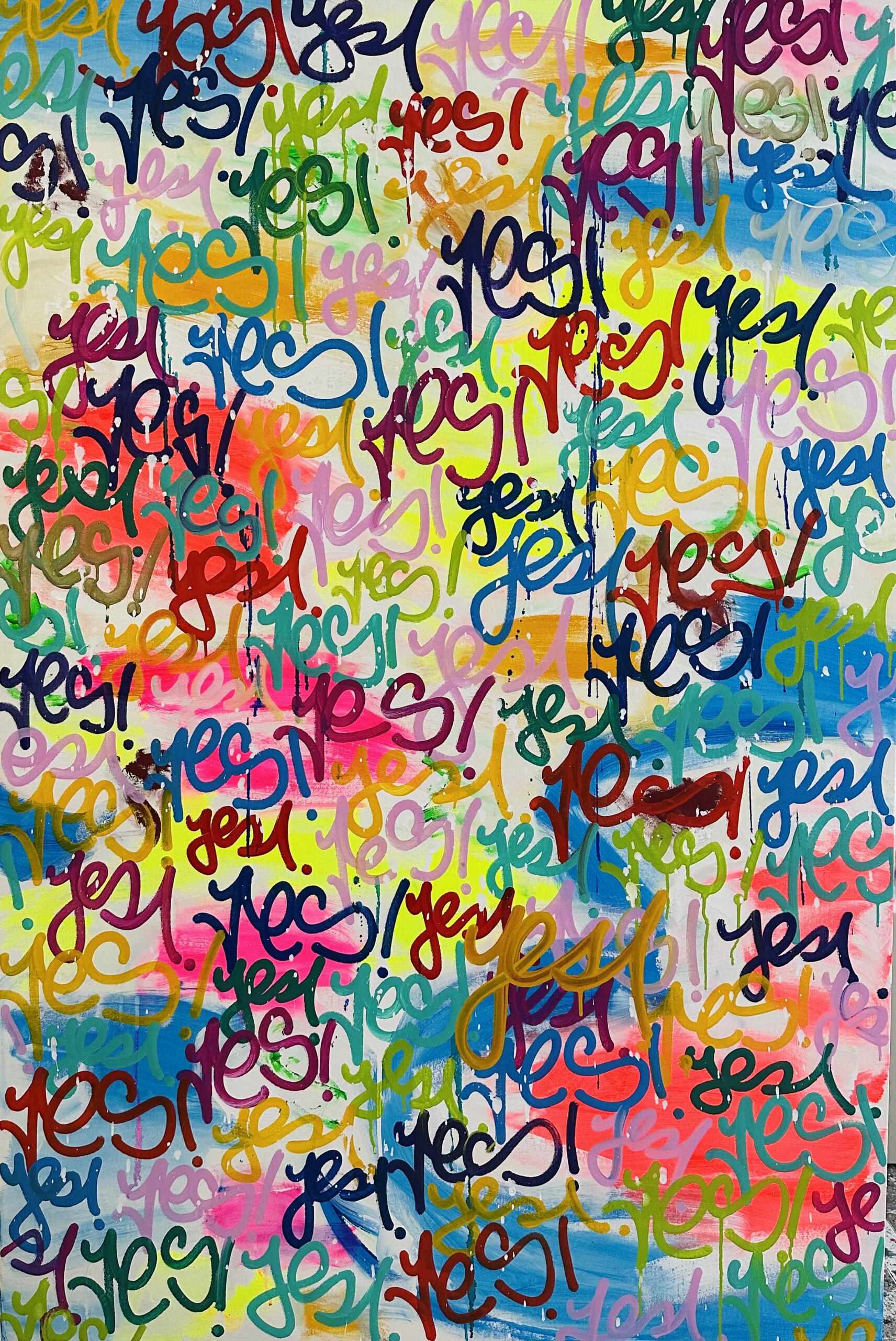 Colorful graffiti with repeated 'yes' and 'no' text on a vibrant wall.