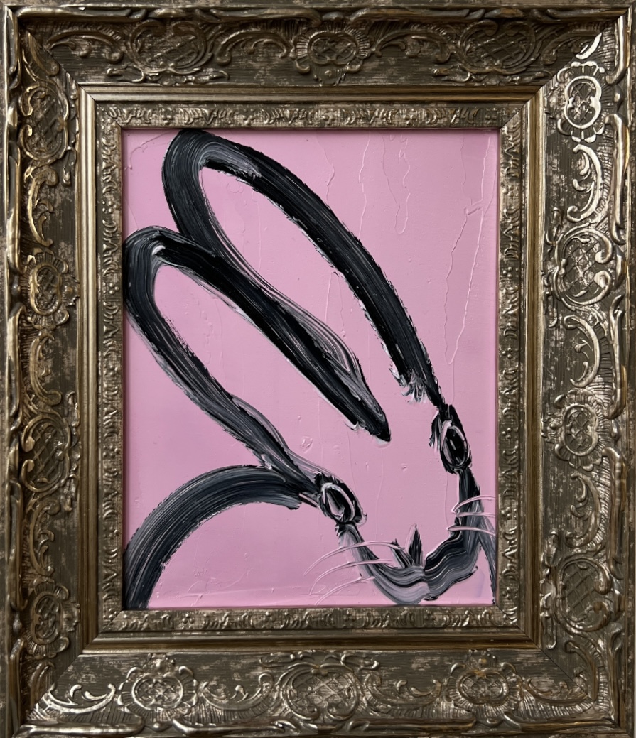 Framed minimalist black brushstroke rabbit on pink background. Framed minimalist black brushstroke rabbit on pink background.