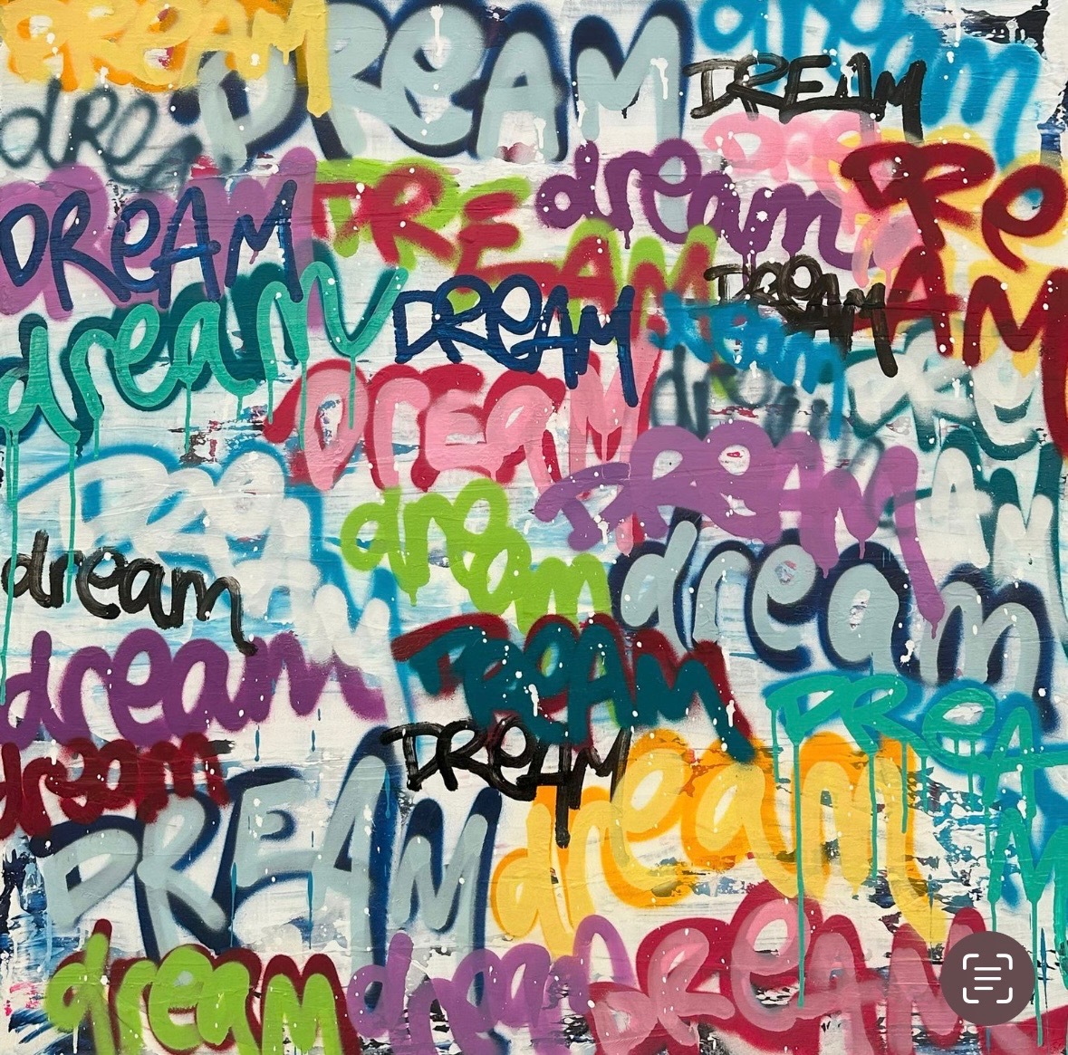 Colorful graffiti art with the word 'dream' repeatedly painted.